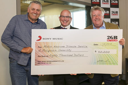 Ray presents massive cheque for a deserving cause