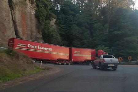 Overlength truck shuts down mountain road
