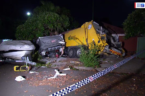 Article image for Garbage truck ploughs into family home