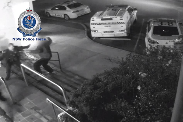 Article image for Shocking CCTV footage shows man allegedly attacking police with a knife