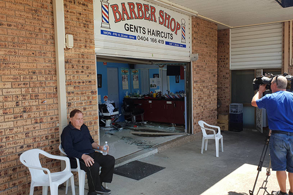 Elderly driver smashes through barber shop in Sydney’s west
