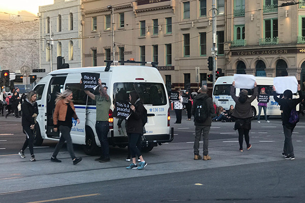 Article image for Dozens arrested as vegan activists’ cause chaos across Australia