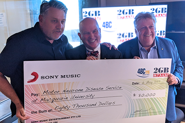 Ray Hadley presents another huge cheque for the fight against MND