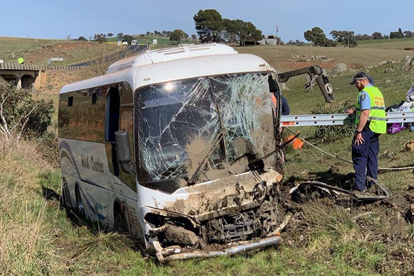 Article image for Nearly 30 injured after bus crashes down embankment