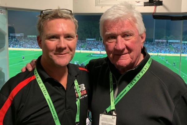 Ray Warren’s ‘proud moment’ going head-to-head with son Chris