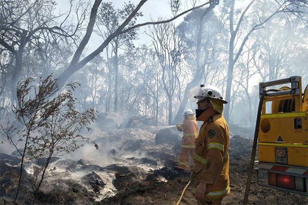‘It feels like Armageddon’: Farmer’s heartbreaking story as bushfire destroys homes