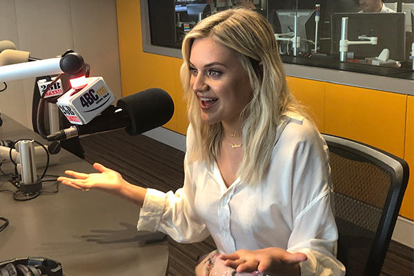 Country music star Kelsea Ballerini hears her new song on the radio for the first time