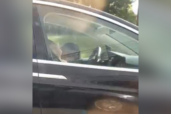 Man caught asleep at the wheel of self-driving car