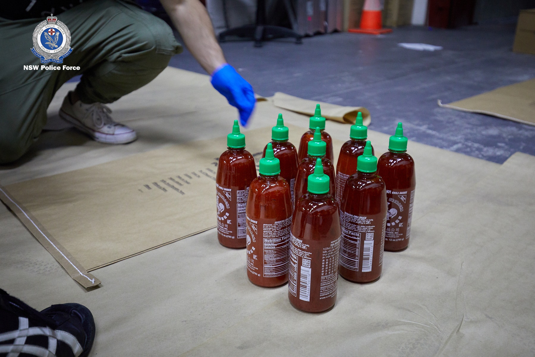 Article image for $300 million worth of ice gives shipment of sriracha sauce an extra kick