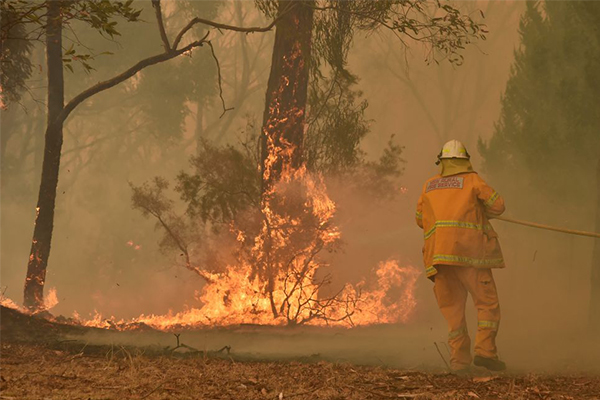 Devastated firefighter tears up at suggestions they ‘failed’ to save town