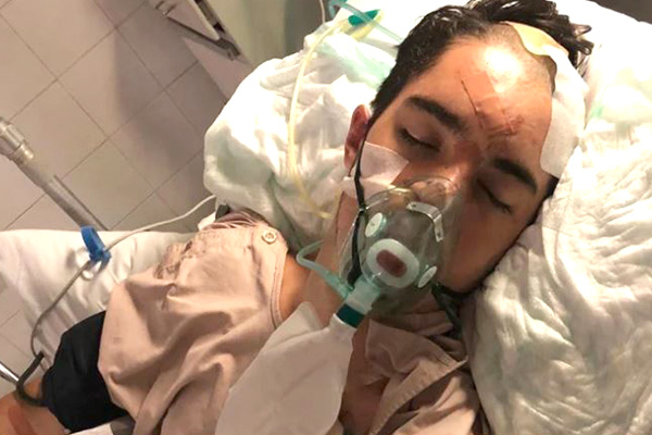 Article image for ‘We’ll get him home’: Hopeful father of schoolie critically injured in horror Bali crash