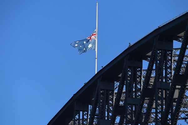 Flags fly at half-mast after three Americans killed fighting fires
