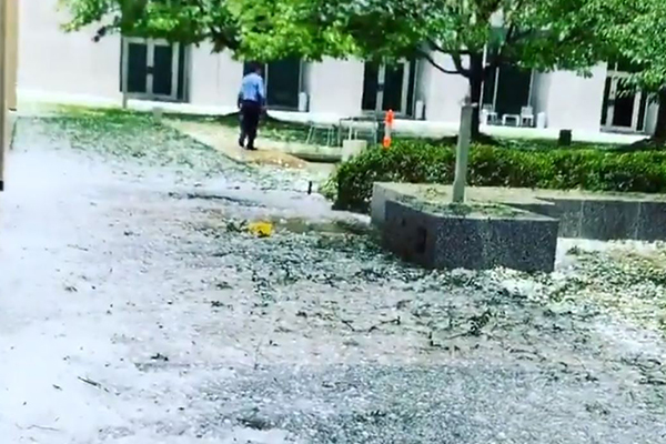 Article image for Hail thrashes Parliament House as severe storm heads for Sydney