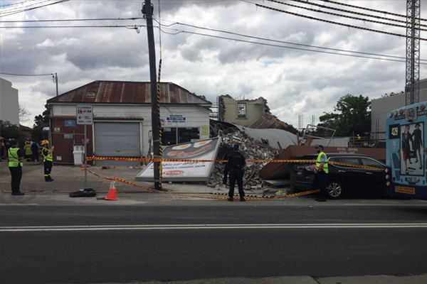 Sniffer dogs searching for trapped people after building collapse, Hurlstone Park