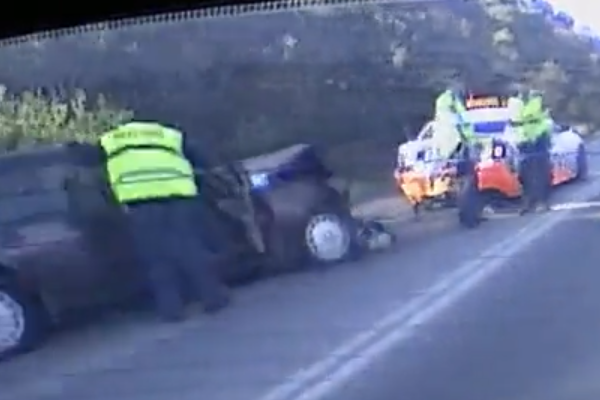 Police car rear-ended at RBT by suspected rubbernecker