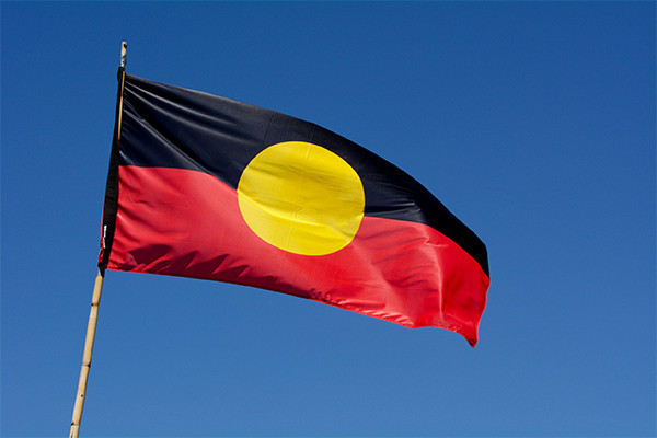 Article image for Aboriginal flag ‘held to ransom’ as clothing company stands by copyright