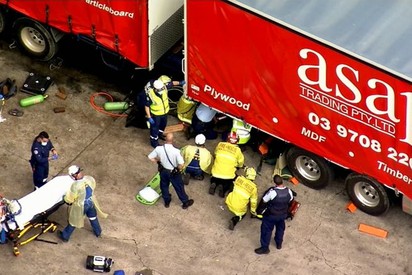 Article image for Incredibly lucky escape after man crushed by a truck at a service station