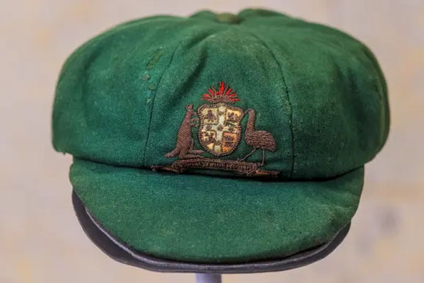 Sir Donald Bradman’s baggy green sells for record price