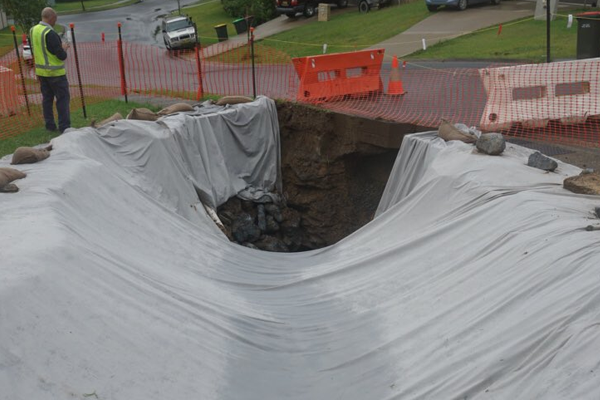 Article image for Sinkhole swallows Coffs Harbour street
