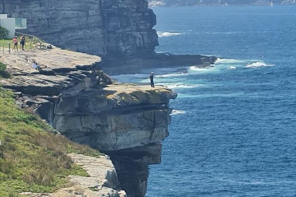 Article image for ‘Moron’ spotted fishing off cliff edge in Sydney’s east