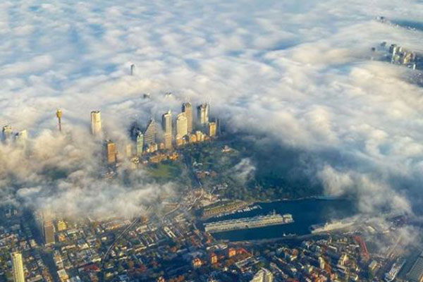Article image for Sydney shrouded in fog and smoke haze