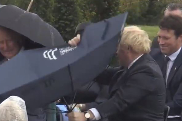 Hilarious footage of Boris Johnson struggling with an umbrella