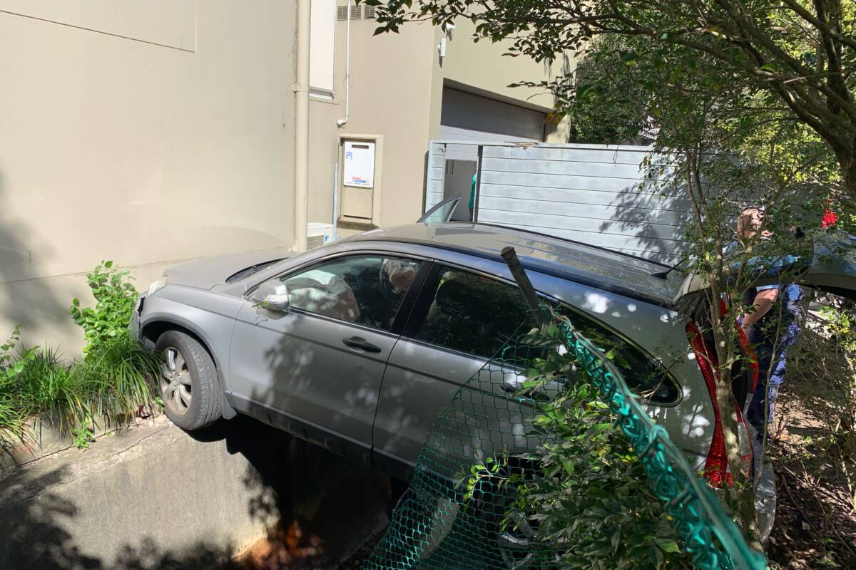 Article image for Elderly driver saved from perilous 8ft drop after car collides with building