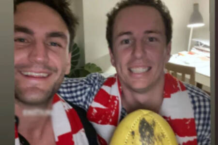 What did lucky Swans fan receive in return for handing back Buddy’s 1000th goal ball?