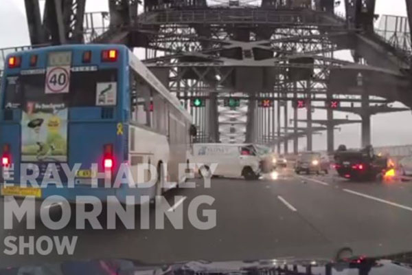 Article image for DASHCAM | Terrifying moment cars collide on Sydney Harbour Bridge