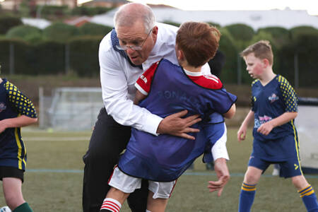 Child tackled by PM gives Ben Fordham a play-by-play of the moment