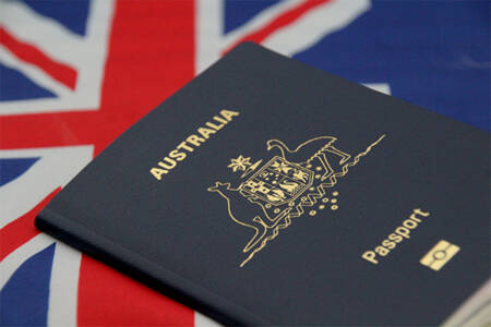 Minister steps in as Aussies wait months for passports