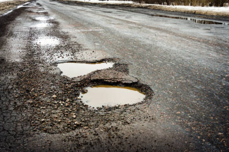 Mayor calls for government to pay for pothole repairs