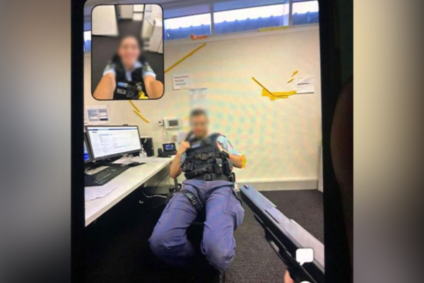 Article image for NSW cops placed on administrative duties after taking bizarre photo