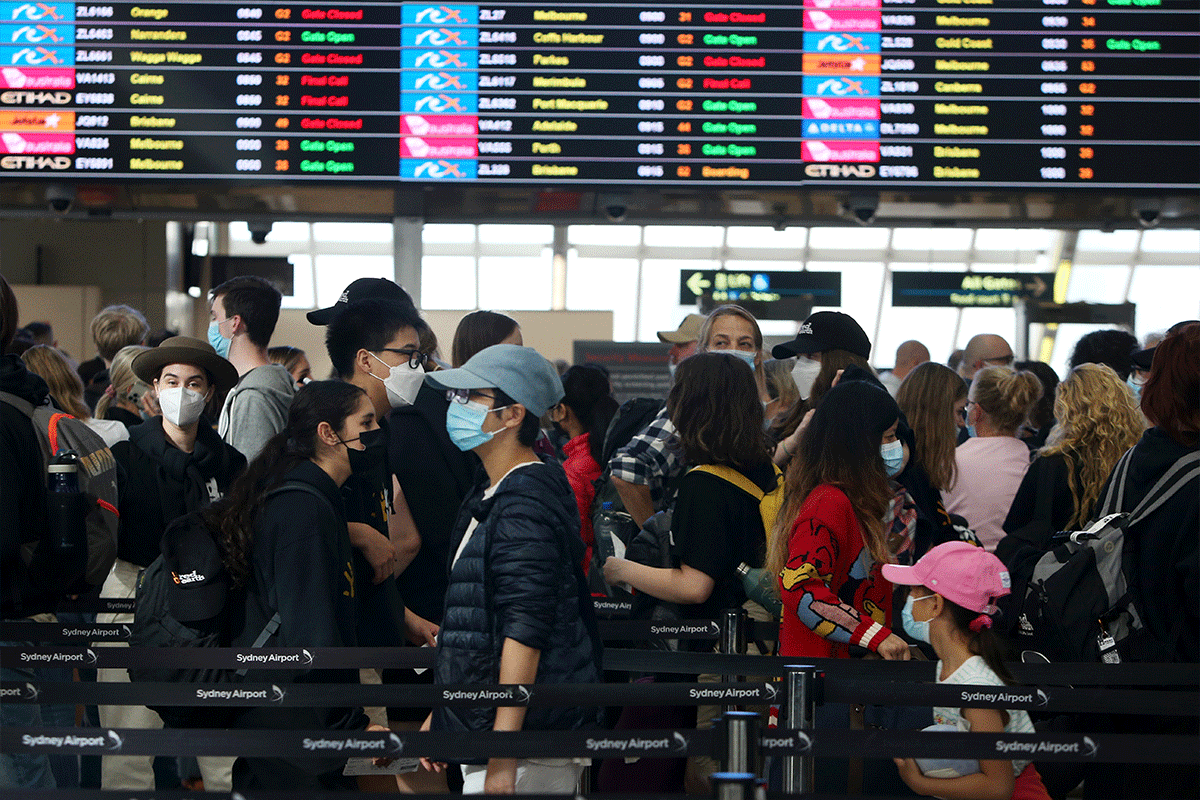 Article image for Major flight delays and cancellations hit Sydney Airport