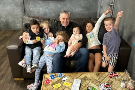 Ray enjoys a delightful breakfast with his six wonderful grandchildren!