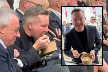 ‘So rude’ – Chris Bowen blasted for eating pasta during mass service