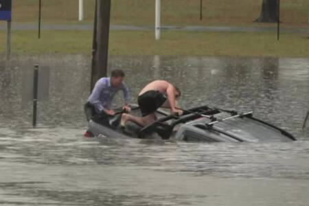 ‘Sprung into action’ – Reporter’s heroics in Queensland floods