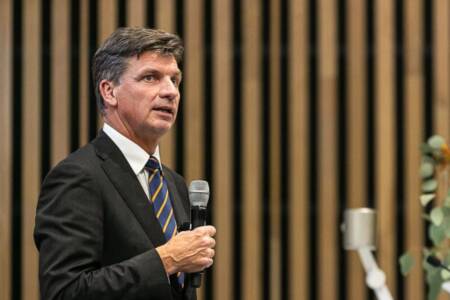 Angus Taylor defends 100K migration cap amid business backlash